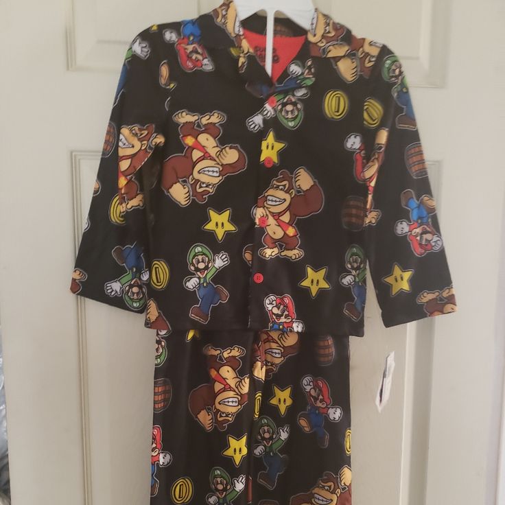 For Sale: Nintendo 2pc Pjs, New. Great For The Mario Brother Fan Or Donkey Kong Fan. Black Cartoon Print Sleepwear For Pajama Party, Black Cartoon Print Sleepwear For Sleepover, Black Cartoon Print Sleepwear, Black Sleepwear With Character Print For Loungewear, Playful Black Bedtime Sets, Playful Black Sets With Character Print, Pikachu Pajamas, Mario Brother, Super Mario Bros Nintendo