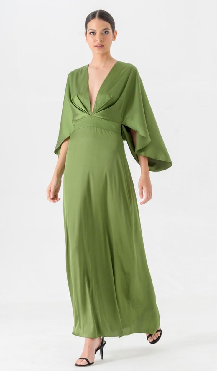 Spring Pre-draped V-neck Maxi Dress, Silk V-neck Dress With Gathered Sleeves, Chic Flowy V-neck Evening Dress, Pre-draped Evening Dress With Tie Back, Silk Maxi Dress With Pleated Back For Cocktail, Green V-neck Satin Evening Dress, Cocktail Maxi Dress With Gathered Sleeves, Green Maxi Dress With Gathered Sleeves, Elegant Green Maxi Dress With Pleated Back