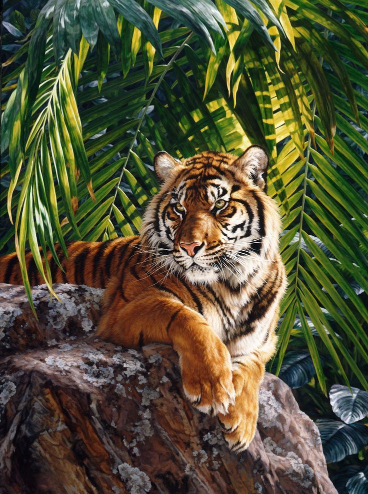 a tiger sitting on top of a rock next to palm trees