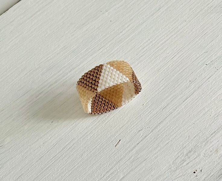 Handmade Minimalist Beige Jewelry, Minimalist Handmade Beige Jewelry, Handmade Adjustable White Rings, Handmade Minimalist Rings With Round Beads, Handmade Brown Jewelry Ring, Handmade Brown Ring Jewelry, White Bohemian Beaded Rings, Unique Handmade Beige Jewelry, Miyuki Ring