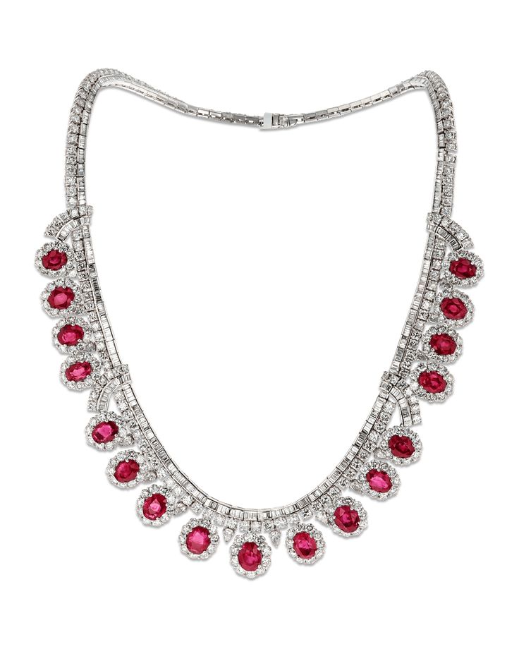 Seventeen untreated Burma rubies totaling 28.98 carats display the perfect “pigeon blood” red hue in this beautiful necklace. Certified by GemResearch SwissLab as untreated Burma rubies, these oval brilliant-cut jewels are perfectly complemented by diamond accents totaling 35.94 carats. Set in platinum. Burmese rubies are counted among the rarest of all gemstones. For centuries, Burma has been associated with the world’s finest rubies, though by edict of the King himself, the finest stones were Gem Stone Necklace, Unusual Facts, Carat Seventeen, Tiffany Necklace, Jewelry For Sale, Ruby Necklace, Expensive Jewelry, Ruby Stone, Blood Red