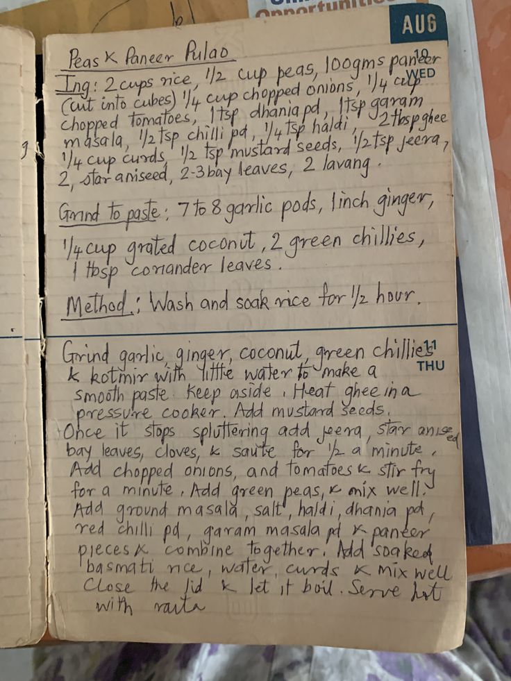 an old recipe book with some writing on the pages and other things to write in it