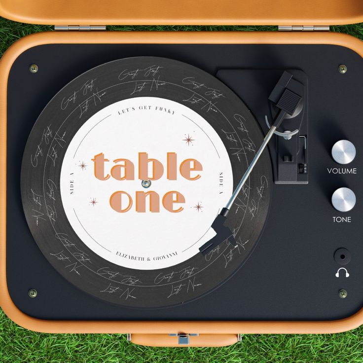 a record player with the words table one on it