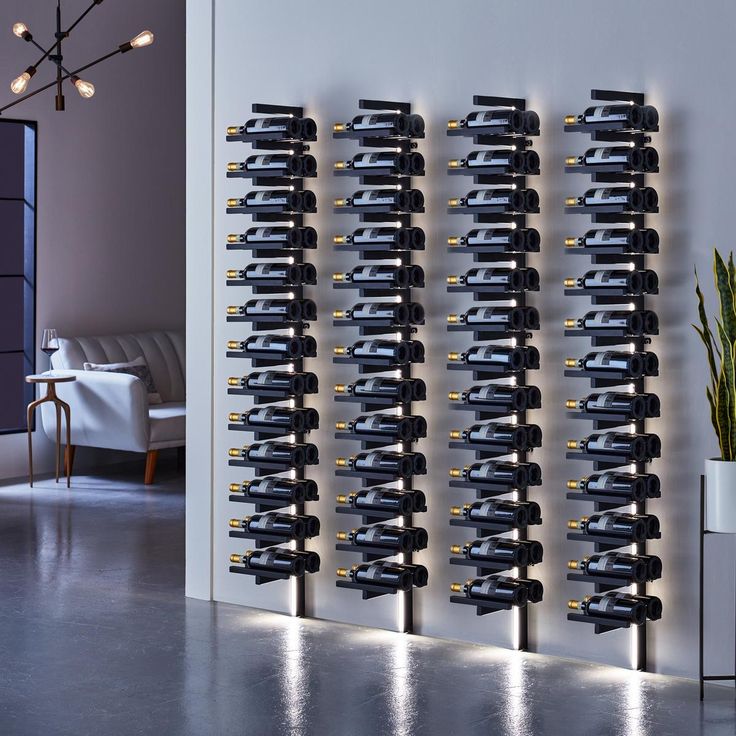 there are many wine racks on the wall