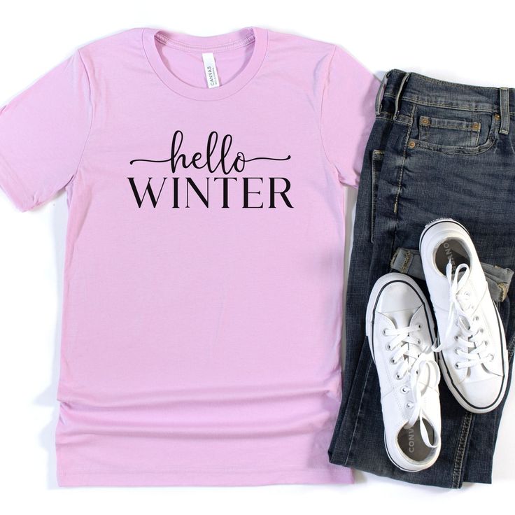 This Hello Winter tee is a perfect way to show your love for all things winter! Wear this super soft and comfortable tee to the coffee shop for your favorite drink, sitting by the firplace, or apres ski! Would be so cute styled with a long skirt to dress it up! Material: 52% Airlume Combed and Ringspun Cotton + 48% Polyester Care: Wash inside out on delicate with cold water. Hang to dry, or tumble dry on low. Cool iron if needed. Do not iron directly on the design. Sizing: This t-shirt is unisex Trendy Winter Crew Neck T-shirt, Trendy Winter T-shirt, Trendy Comfortable Winter Tops, Trendy Winter Tops With Comfortable Fit, Trendy Comfortable Fit Tops For Winter, Soft-washed Winter Tops For Everyday, Cozy Relaxed Fit T-shirt With Graphic Print, Comfortable Soft-washed Tops For Winter, Casual Everyday Winter T-shirt