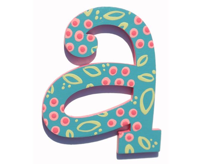 the letter b is made out of wood and has pink dots on blue with green leaves