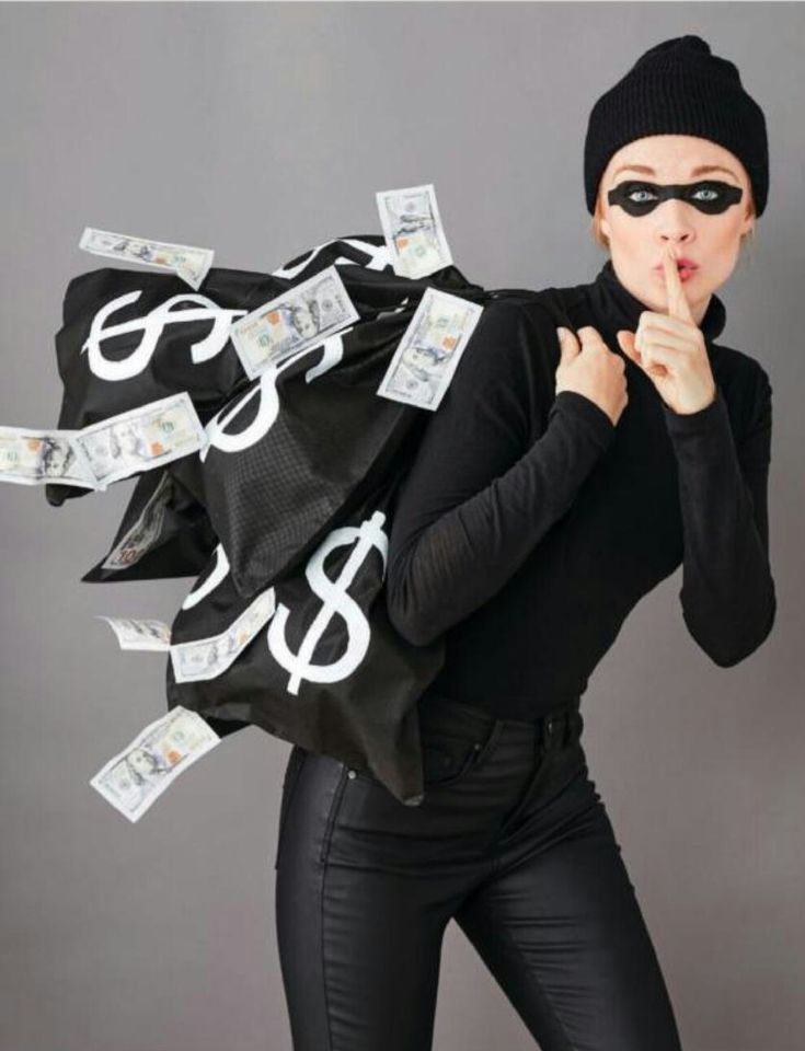 a woman in black with money bags on her back and the words $ 8 printed on it