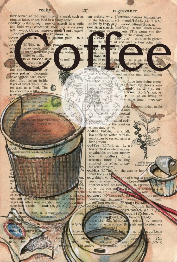 an old book with coffee and other items on it, including a cup of coffee