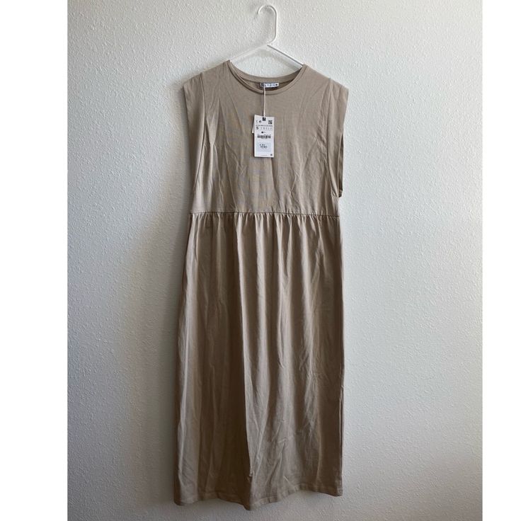 Size Small Nwt Fall Sleeveless Beige Dress, Beige Linen Midi Dress For Day Out, Neutral Casual Midi Length Maxi Dress, Khaki Midi Dress For Spring Daywear, Khaki Sleeveless Midi Dress For Spring, Casual Beige Sleeveless Dress For Spring, Khaki Midi Summer Dress For Day Out, Summer Khaki Midi Dress For Day Out, Brown Midi Length Sleeveless Dress For Spring