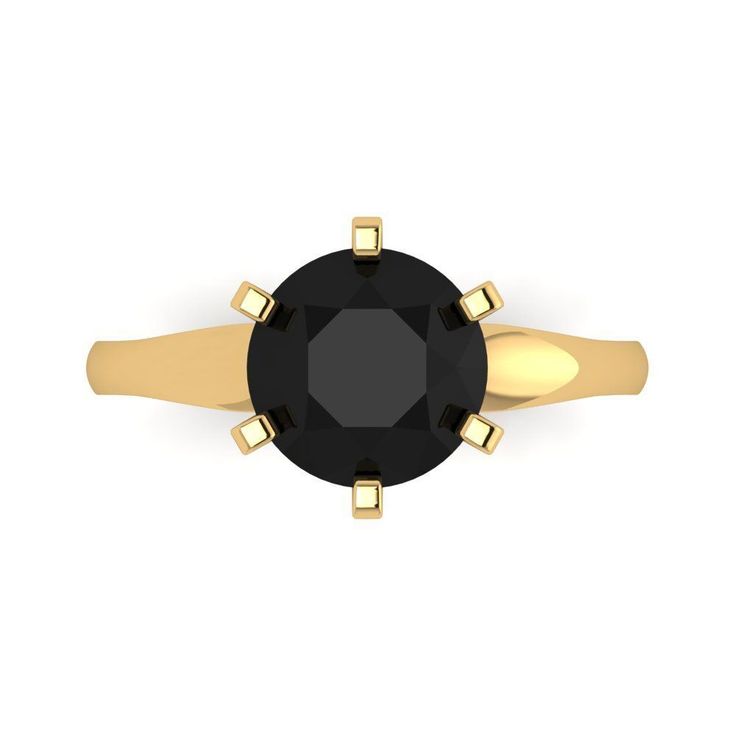 a black diamond ring with gold accents on the sides and an open band around it