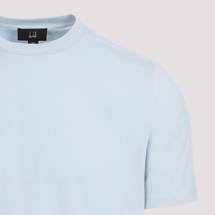 Dunhill Ad Insignia Light Blue Cotton T-shirt. Light Blue cotton, basic design, rounded ribbed neckline, short sleeves, straight hem. Modern Crew Neck T-shirt With Ribbed Neckline, Classic Solid T-shirt With Ribbed Neckline, Casual Blue T-shirt With Ribbed Neckline, Modern Solid Color Short Sleeve T-shirt, Modern Short Sleeve T-shirt, Blue T-shirt With Ribbed Crew Neck, Classic Blue T-shirt For Summer, Classic Fitted Blue T-shirt, Blue Short Sleeve T-shirt With Ribbed Neckline