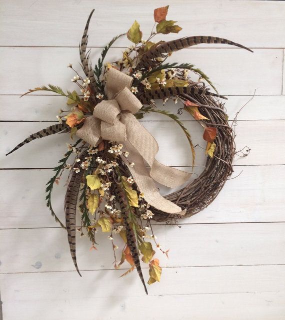 a wreath made out of twigs and leaves