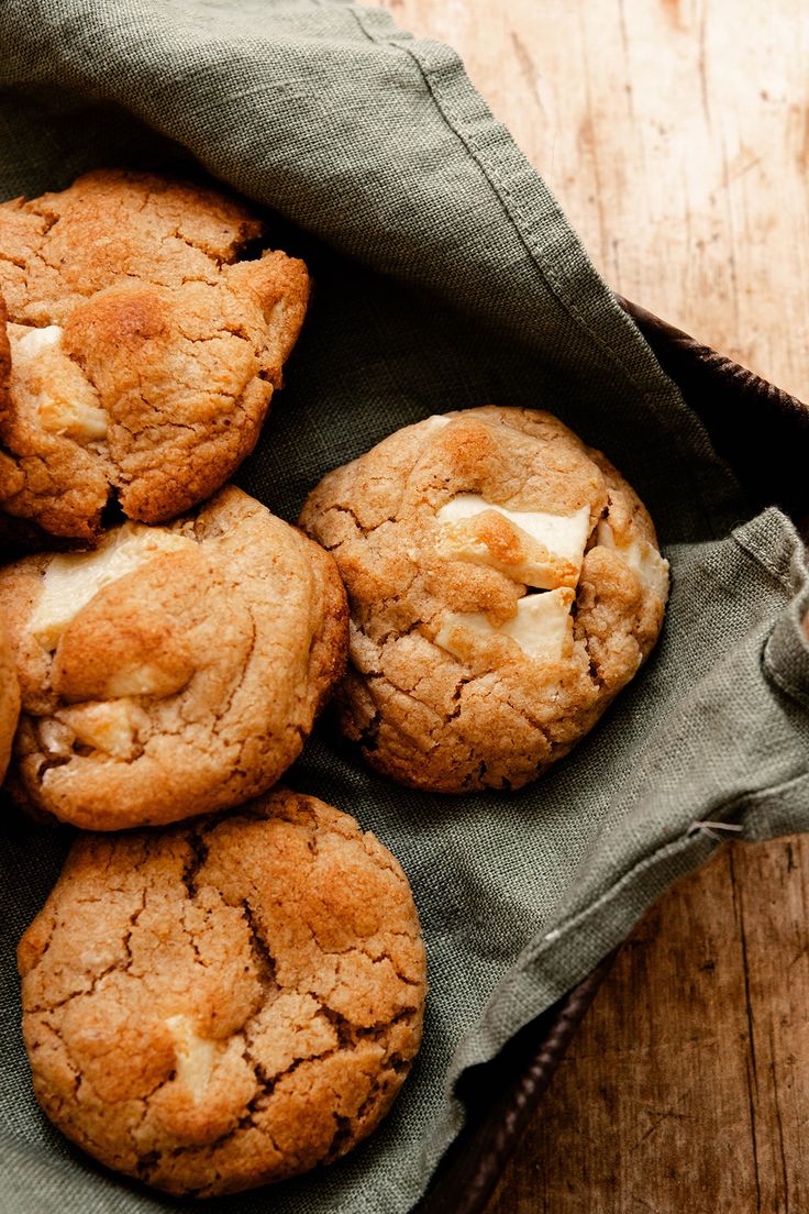 cookies with marshmallows in a bag on a wooden table