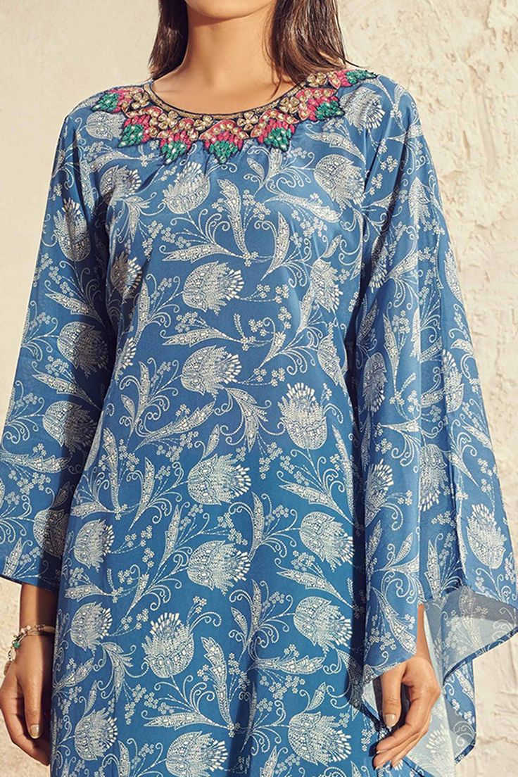 Blue kaftan-style kurta with all-over print, embroidered neckline, draped sleeve and asymmetric hem. Comes with sea green palazzo.
Component: 2
Printed, Embroidered
Neckline: Round
Sleeve Length: Full
Fabric: Crepe, Cotton
Color: Blue, Green
Asymmetric hem - Aza Fashions Blue Kaftan, Kurta And Palazzo, Kaftan Style, Women Kurta, Palazzo Set, Drape Sleeves, Embroidered Neckline, Sea Green, Set For Women