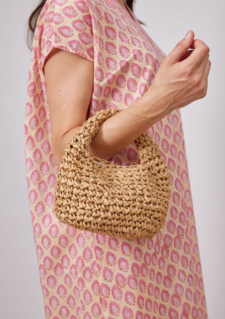 Your go to Micro Bag this season that is the perfect accessory to any outfit. Slouchy with a little structure, our Micro Slouch Bag can hold all of your summertime essentials. Shop Toast Material: 100% Paper Straw/ Lining is 100% Linen Measurements: 9.5" x 6" Spot Clean with Damp Cloth Beige Pouch Hobo Bag For Summer, Beige Summer Hobo Pouch Bag, Summer Beige Hobo Bag Pouch, Casual Woven Hobo Bag In Pouch Shape, Casual Woven Hobo Pouch Bag, Summer Woven Pouch Bag, Spring Straw Bag With Removable Pouch And Top Handle, Summer Woven Pouch Shoulder Bag, Spring Straw Bag With Top Handle And Removable Pouch