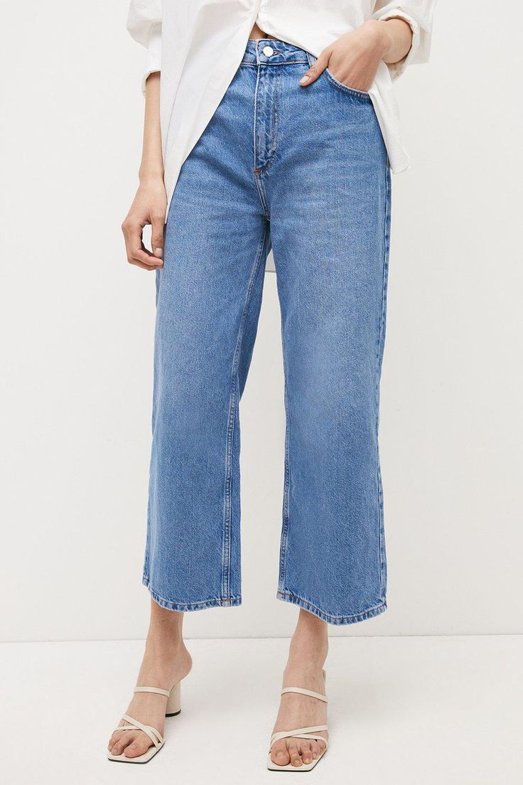 Upgrade Your Denim Collection In Time For Summer With These Versatile Cropped Jeans. They Feature A Relaxed, Wide-Leg Fit That Drapes To A Flattering Above-Ankle Height To Show Off Your Favorite Seasonal Sandals, Along With A Classic Five-Pocket Design And High-Rise Waistband. Pair Them With Anything And Everything For A Laid-Back But Always Fashionable Look. Versatile Spring Flare Jeans For Everyday, Versatile Flare Jeans For Spring, Trendy Spring Cropped Jeans, Versatile Wide-leg Cropped Denim Jeans, Medium Wash Cropped Jeans For Everyday In Spring, Everyday Medium Wash Cropped Jeans For Spring, Versatile Medium Wash Jeans For Spring, Trendy Relaxed Fit Cropped Jeans, Versatile Medium Wash Spring Jeans