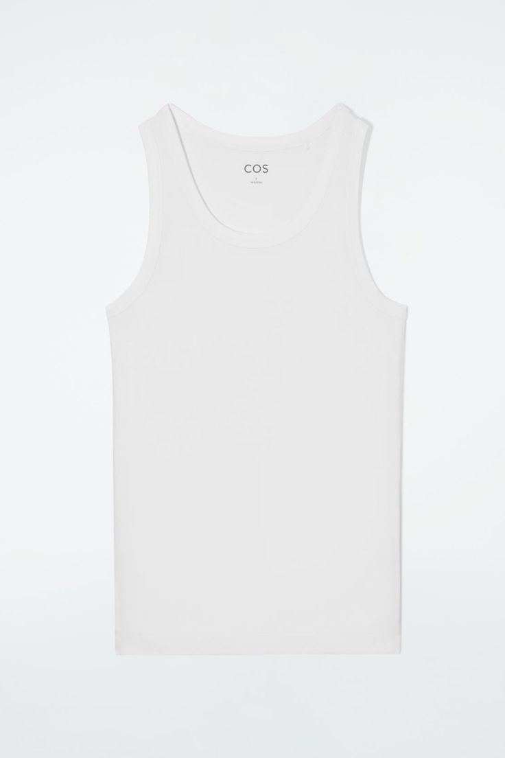 Made from organic cotton with a touch of stretch, this slim-fit tank top is an essential on warmer days. - Round neck- Sleeveless design- Organic cotton is grown from non-genetically modified seeds without chemical fertilizers or pesticides 97% Organic cotton, 3% Elastane / Machine washableBack length of size S is 24¼" Basic Spring Tank Top, Basic Fitted Vest For Spring, Fitted Basic Spring Vest, Spring Fitted Basic Vest, Spring Basic Fitted Vest, Classic Stretch Tank Top For Everyday, Basic Stretch Tops For Summer, Spring Solid Ribbed Tank Top, Spring Ribbed Tank Top