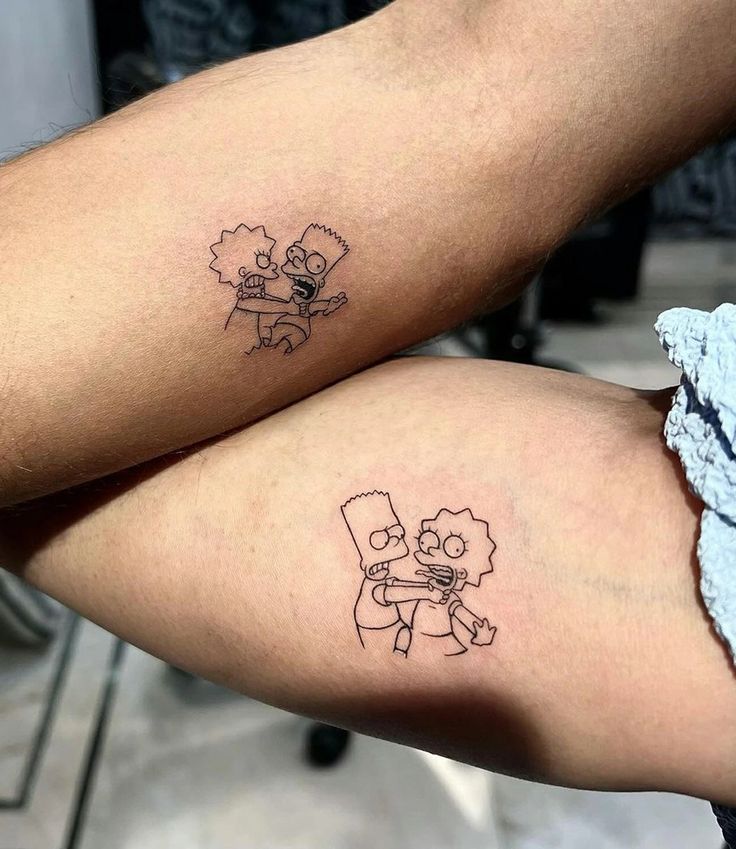 two people with matching tattoos on their legs