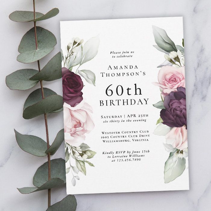 an elegant floral birthday party with pink and purple flowers on the front, greenery in the back