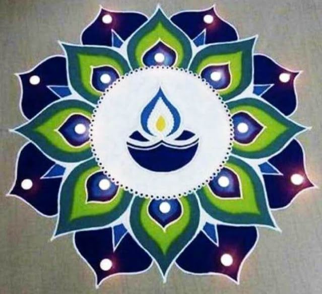 a blue and green flower with candles in the center on a gray background that says happy diwali