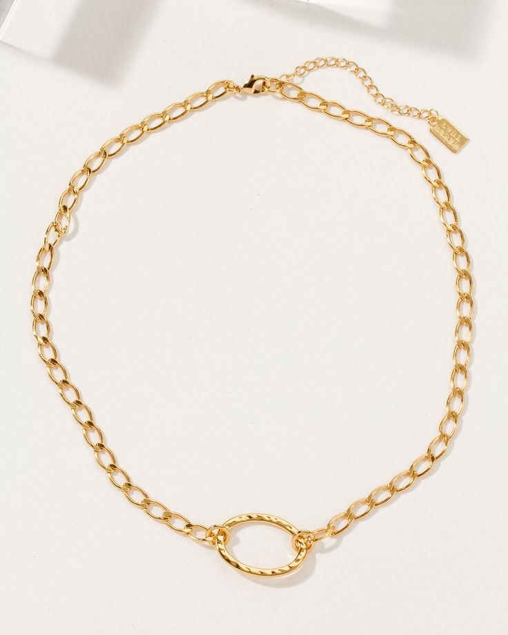 Boasting a beautiful golden plating that is perfectly crafted to accentuate all skin tones, this piece is sure to flatter every look. Not only is this piece beyond stunning, but it's also extremely versatile and can easily transition from day to night. Wear it as a single layer or layer it up - it's completely up to you! Gold-tone Delicate Chain Necklace, Gold Layered Necklace With Delicate Chain, Elegant Matte Gold Necklace With Adjustable Chain, Gold-tone Metal Charm Necklace With Delicate Chain, Chic Metal Charm Necklace With Adjustable Chain, Elegant Gold Plated Chunky Chain Charm Necklaces, Gold-tone Brass Choker Chain Necklace, Elegant Gold-plated Chunky Chain Charm Necklace, Elegant Gold Charm Necklace With Chunky Chain