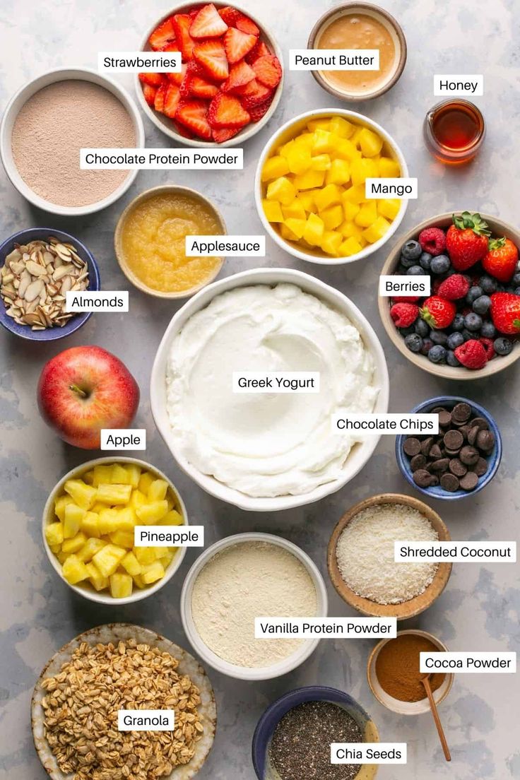 an overhead view of the ingredients for a fruit and nutritious smoothie in bowls