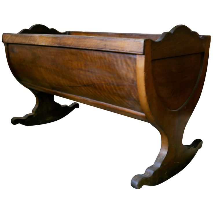 an old wooden bench is shown against a white background