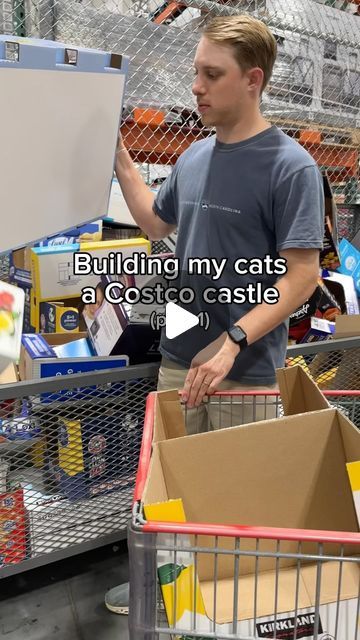 a man is shopping in a grocery store with his cart full of boxes and supplies