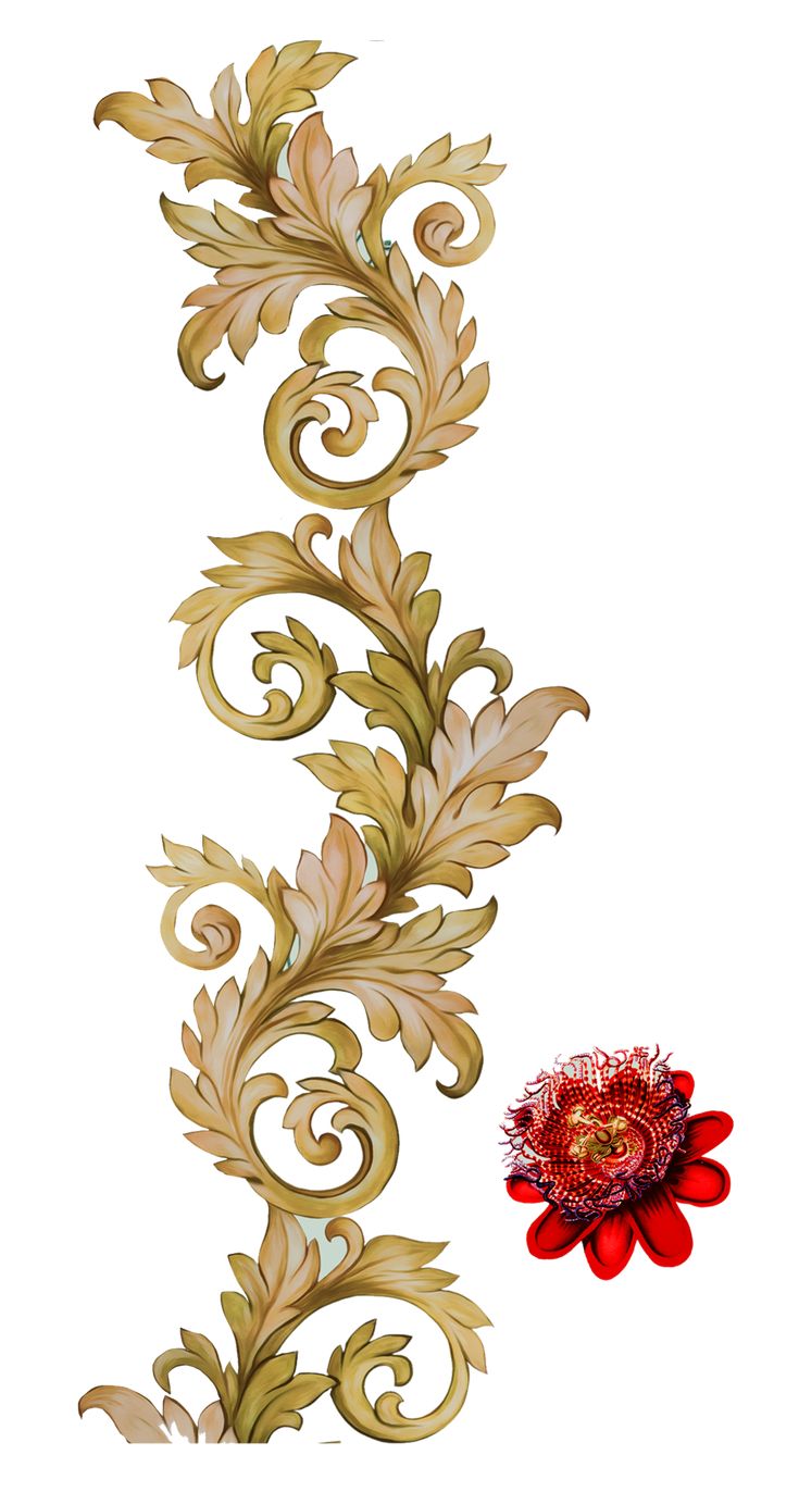 a red flower sitting on top of a wooden table next to a wall hanging decoration