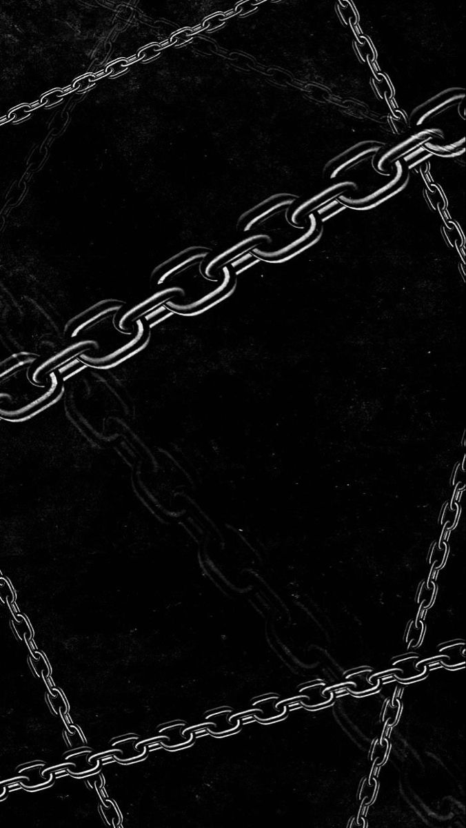 a black and white photo with chains on it