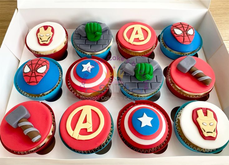 the cupcakes are decorated like superheros