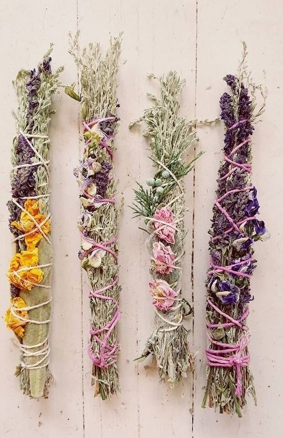 four bundles of dried herbs tied together