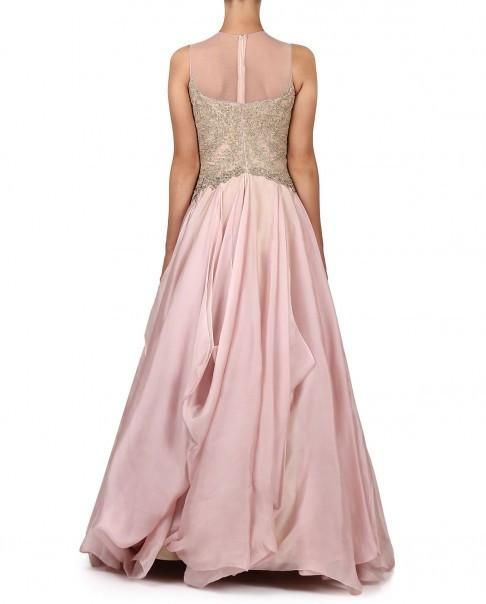 This pink gown is in satin organza fabric with cancan underneath it. The bodice part of this pink gown is embellished with round neckline. Can be customised in any colour. Note: Delivery within 4-6 weeks once the measurements are received/ You will get the measurement form within 24 hours of order placement. We always put orders on hold for 24 hours due to our Cancellation Policy so that if you want to cancel the order you can cancel it without hassles Pink Gown With Fitted Bodice For Wedding, Pink Taffeta Party Gown, Pink Wedding Gown With Fitted Bodice, Pink Gown With Fitted Bodice For Debutante Ball, Pink Taffeta Evening Dress For Wedding, Pink Satin Ball Gown For Debutante Ball, Pink Taffeta Evening Dress For Party, Pink Sleeveless Satin Ball Gown, Sleeveless Pink Satin Ball Gown