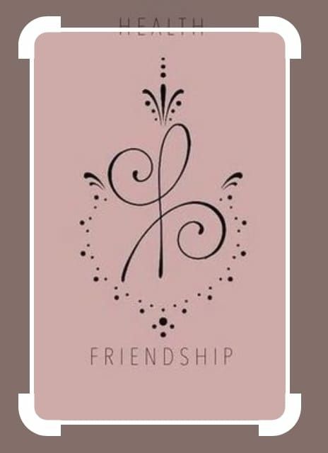 a pink card with the words friendship written in black on it and an image of a