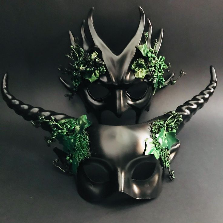 Adorned with intricate horn details and lush foliage, this mask set embodies the spirit of the forest. Be the best dressed at the ball, Halloween party, or any other event with these masks! Age Group/Gender - Adult/Unisex Size/Type - One size fits all adults Mask Material - Polyresin Accent Material - Paint Special Features - Forest embellishments Fantasy Masks For Halloween, Fantasy Masquerade Mask For Halloween, Green Fantasy Costume Accessories For Party, Fantasy Masks For Carnival Events, Fantasy Halloween Masks, Fantasy Eye Mask For Themed Events, Fantasy Masks For Carnival, Fantasy Masks For Carnival Themed Events, Fantasy Masquerade Mask For Mardi Gras