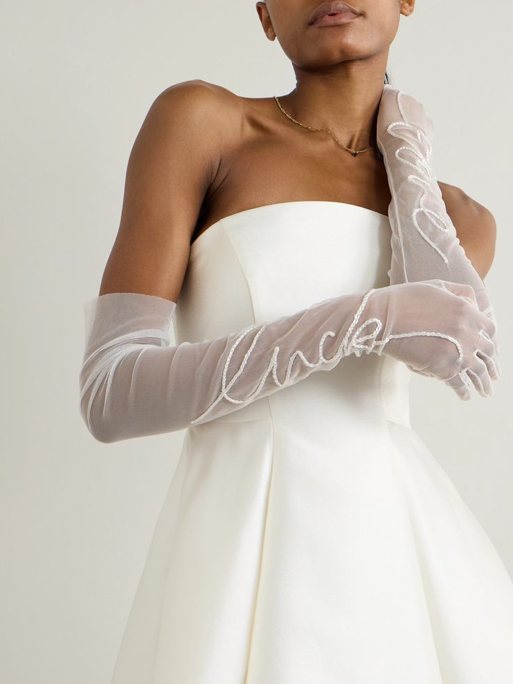 Halfpenny London's gloves are sweetly hand-embroidered to wish you 'Love & Luck' on your wedding day. They're made from delicate tulle and have an opera-length silhouette that beautifully complements sleeveless gowns. Fitted Organza Bridal Accessories For Weddings, Elegant Fitted Tulle Bridal Accessories, White Gloves Wedding, Poland Clothing, Opera Wedding, Tulle Gloves, Halfpenny London, London Accessories, Wedding Gloves