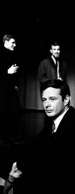 black and white photograph of three men in suits