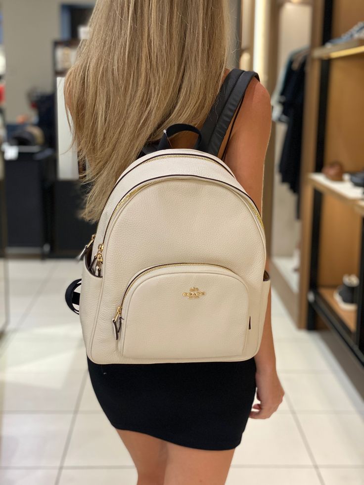 Refined pebble leather Inside zip and multifunction pockets Double zip closure, fabric lining Handle with 2 1/4" drop Outside zip pocket Adjustable shoulder straps 10 3/4" (L) x 12 1/2" (H) x 4 3/4" (W) Style No. 5666 Senior Year Fun, Boutique Brands, Senior Year, Style Gift, Global Fashion, Pebbled Leather, Shoulder Straps, Chalk, Zip Pockets