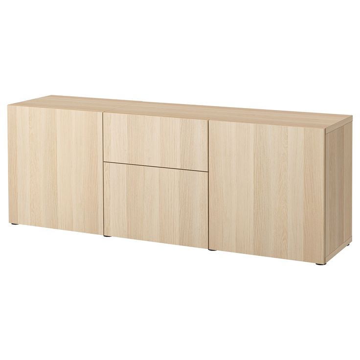 the sideboard is made from wood and has three doors