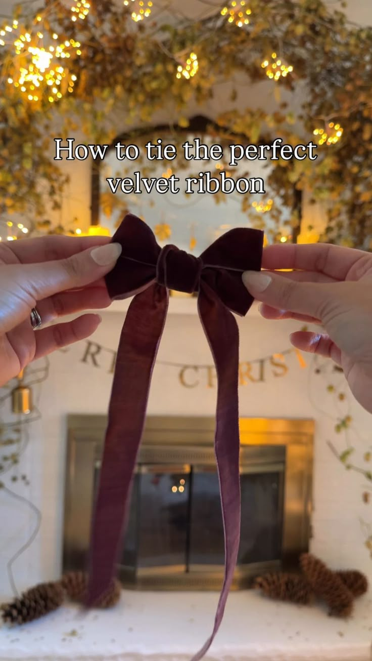 two hands holding onto a ribbon with the words how to tie the perfect velvet ribbon