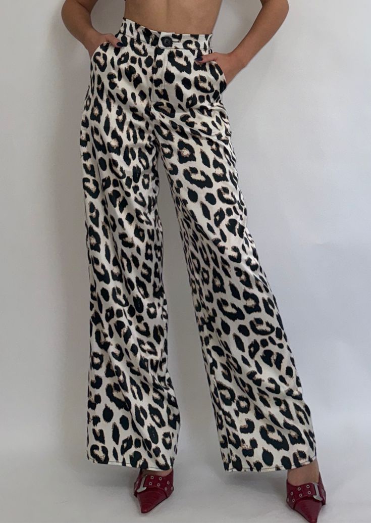 Step into Fall in our Wild Side Leopard Pants. Stylish and chic, these timeless pants will always be a staple in your closet! Lightweight and breathable, featuring a high waist and silky feel. 97% POLYESTER 3% SPANDEX HAND WASH, DO NOT BLEACH, DRY FLAT, LOW IRON. Jill is 5'3" and wearing a size Small. Stretch Full Length Leopard Print Bottoms, Cotton Wide Leg Leopard Print Pants, Wide Leg Leopard Print Bottoms With Pockets, Casual Leopard Print Wide-leg Pants, Stretch Leopard Print Full-length Bottoms, Leopard Pants, Sweater Blazer, British Indian, Sweater Dress