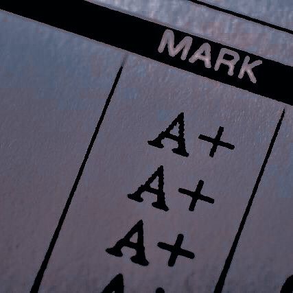 a close up of a parking sign with the words mark and a plus on it