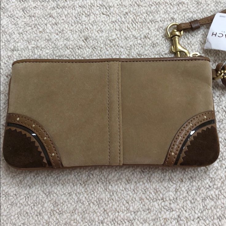 Brand New Coach Factory Wristlet Wallet In Suede. Tan And Brown Everyday Coach Leather Wristlet, Coach Leather Wristlet With Zipper Closure, Brown Rectangular Wristlet For Everyday Use, Everyday Brown Wristlet With Zipper Pouch, Everyday Brown Rectangular Wristlet, Brown Everyday Rectangular Wristlet, Coach Leather Wristlet With Removable Pouch, Brown Bifold Clutch With Zipper Closure, Brown Clutch Wristlet For Travel