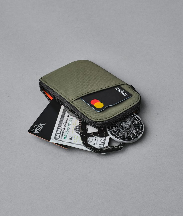 This pocket-sized wonder is great for storing your cards, coins, and loose cash (folded) in one place. Not only is it durable and lightweight, but it also offers great organization options with its front pocket and zippered compartment. And here's the best part - it's compatible with our HUB Ecosystem, allowing you to easily connect it to your backpack strap, sling, or messenger bag for quick access. Prefer a hands-free option? Attach it to your belt and enjoy maximum accessibility while carryin Card Pouch, Small Pouches, Backpack Straps, Leather Craft, Front Pocket, Green And Grey, Messenger Bag, Pouch, Wonder