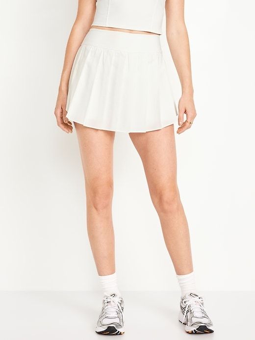 High-Waisted StretchTech Pleated Skort | Old Navy Casual Fitted White Athletic Shorts, Casual Nylon Tennis Skirt For Sports, Casual Nylon Skort For Sports, Functional Summer Tennis Skirt With Built-in Shorts, Casual Nylon Tennis Skirt For Workout, Functional Tennis Skirt For Summer Gym, Casual Nylon Skort With Moisture-wicking, White Nylon Athletic Shorts With Built-in Liner, Casual Nylon Tennis Skirt With Moisture-wicking