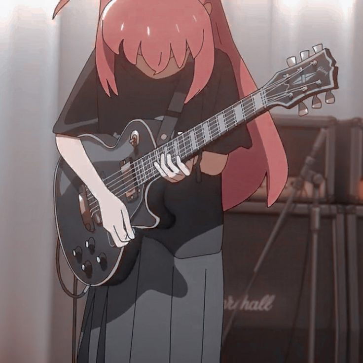 a girl with pink hair playing a guitar