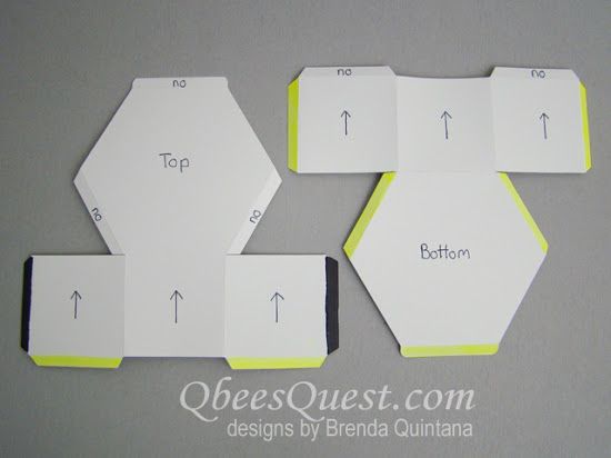 several pieces of paper cut out to look like hexagons with arrows pointing in different directions