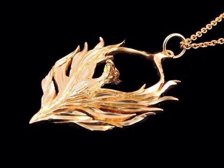 This Phoenix pendant is solid 14k yellow gold. It measures 41mm tall and 35mm wide. The bail can accommodate up to a 4.5mm wide chain. The Phoenix is available with a 20 or 24 inch 1.5mm 14k yellow gold solid cable link chain. *This pendant is shown on the 20 inch chain option. ASK ABOUT CUSTOMIZATION: This Item along with most of my other pieces of jewelry can be customized in terms of metal type, chain length and incorporating gemstones or other materials. A tag of authenticity comes with each Ceremonial Gold Art Nouveau Jewelry, Art Nouveau Yellow Gold Pendant Jewelry, Nature-inspired Yellow Gold Pendant Jewelry, Flame Jewelry, Enchanted Jewelry, Phoenix Pendant, Tourmaline Pendant, Feather Pendant, Yellow Gold Pendants