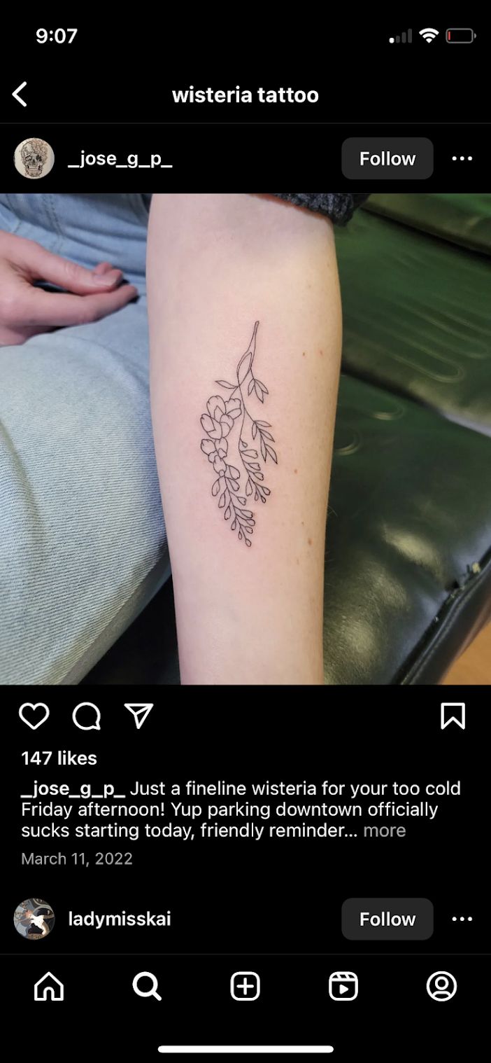 a tattoo on someone's leg with flowers