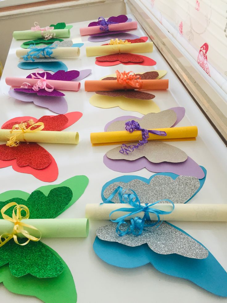 paper flowers are laid out on a table